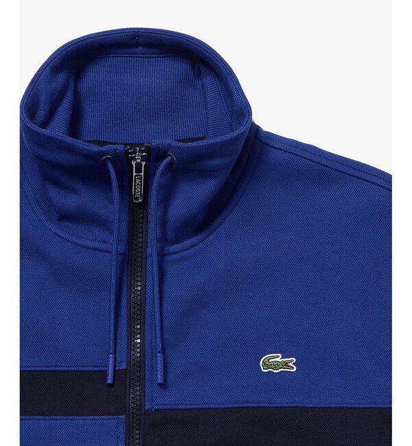 LACOSTE「アシンメトリーボーダーハイネック ドローストリング 鹿の子地 トラックジャケット」|スウェット・ジャージ|