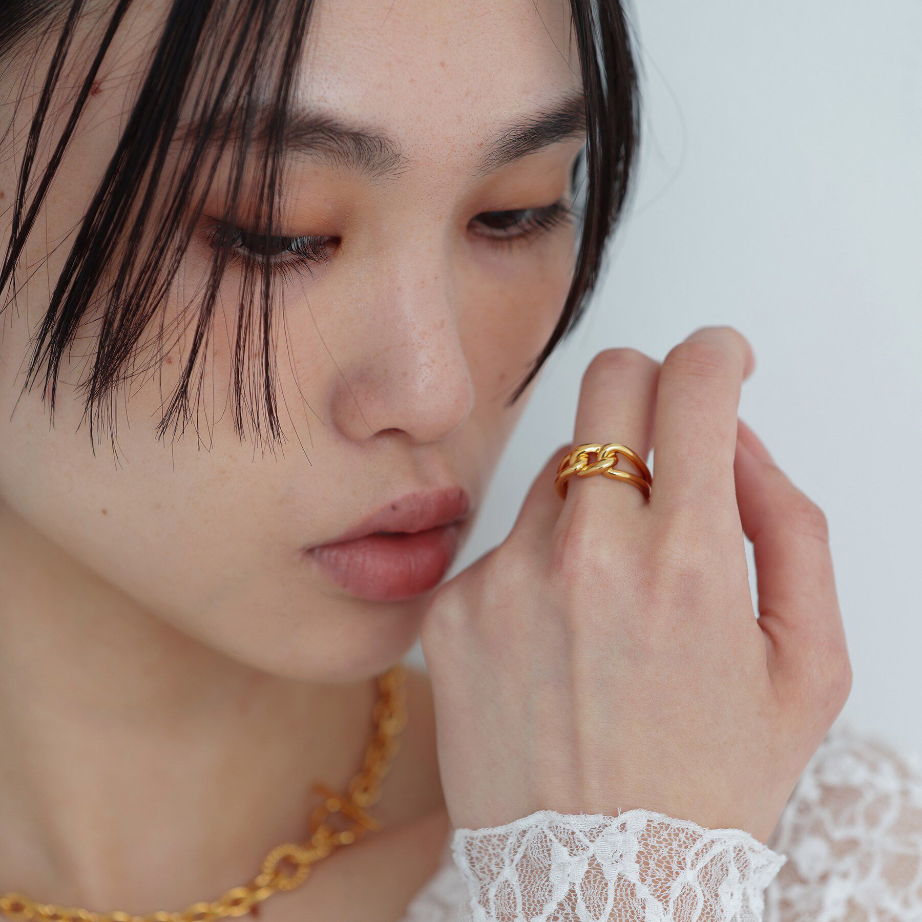 COCOSHNIK ONKITSCH「シルバー カーブチェーンモチーフノットリング GP」|リング|