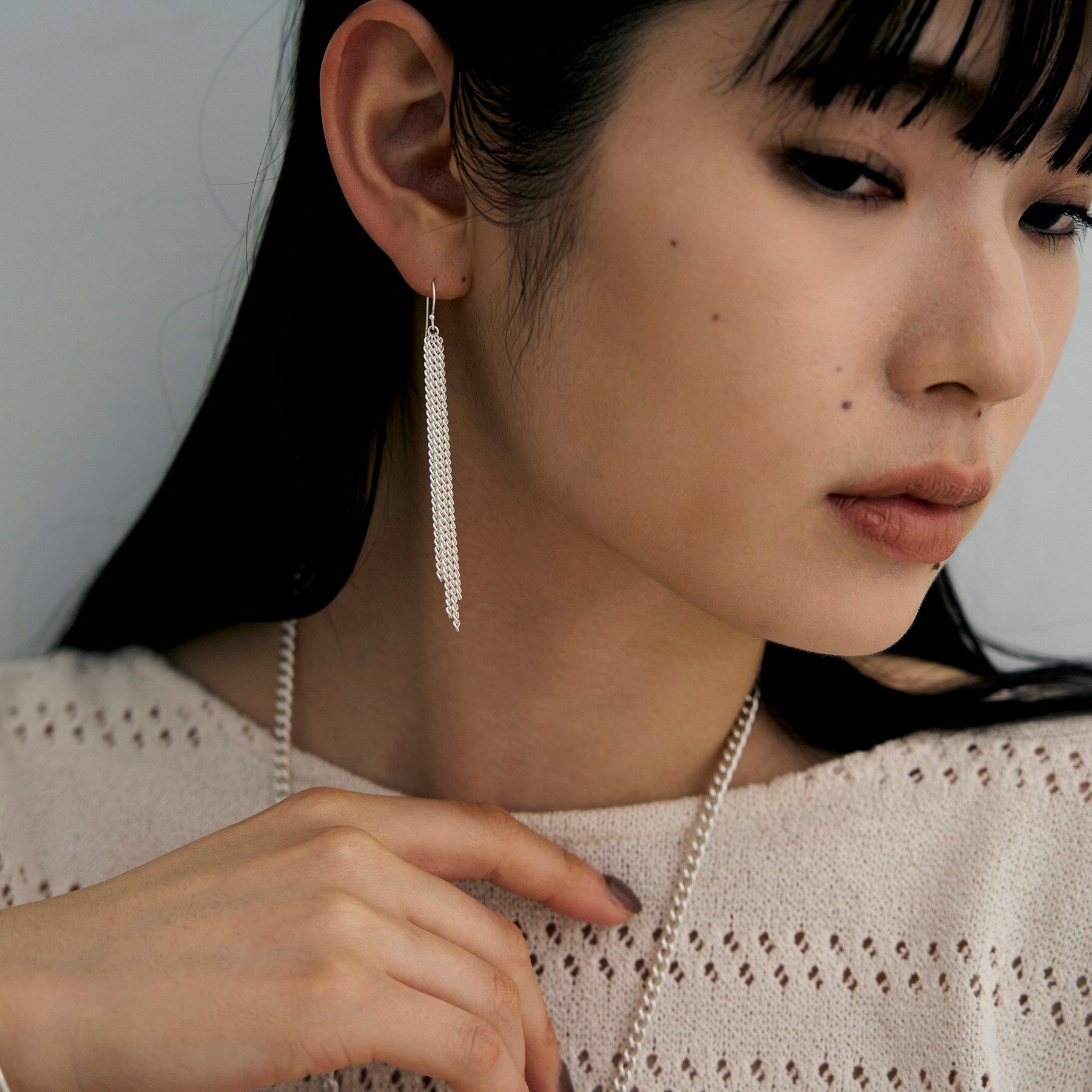 COCOSHNIK ONKITSCH「シルバー カーブチェーンフリンジピアス」|ピアス|