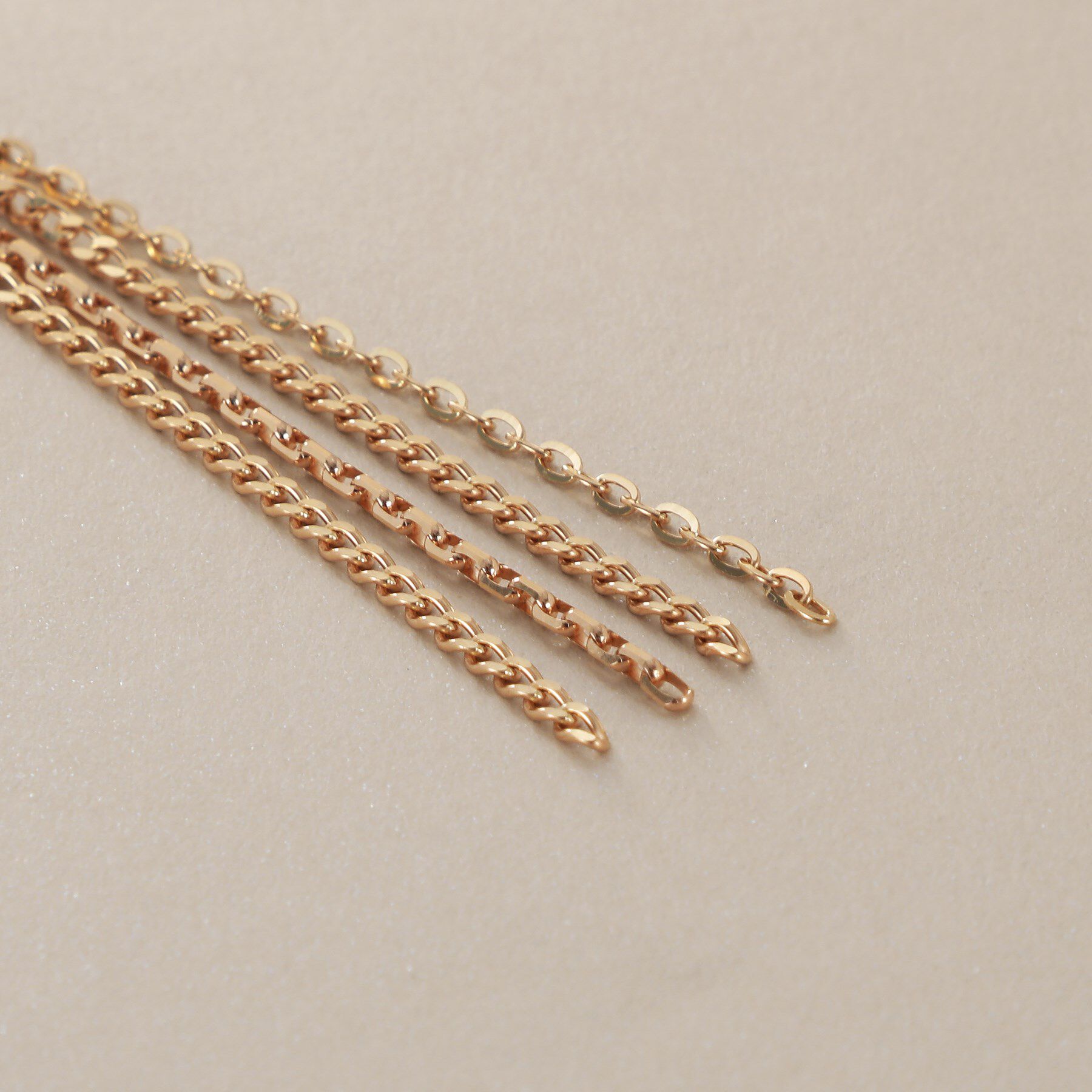 COCOSHNIK「K10キヘイミックスチェーンフリンジ スタッズピアス」|ピアス|