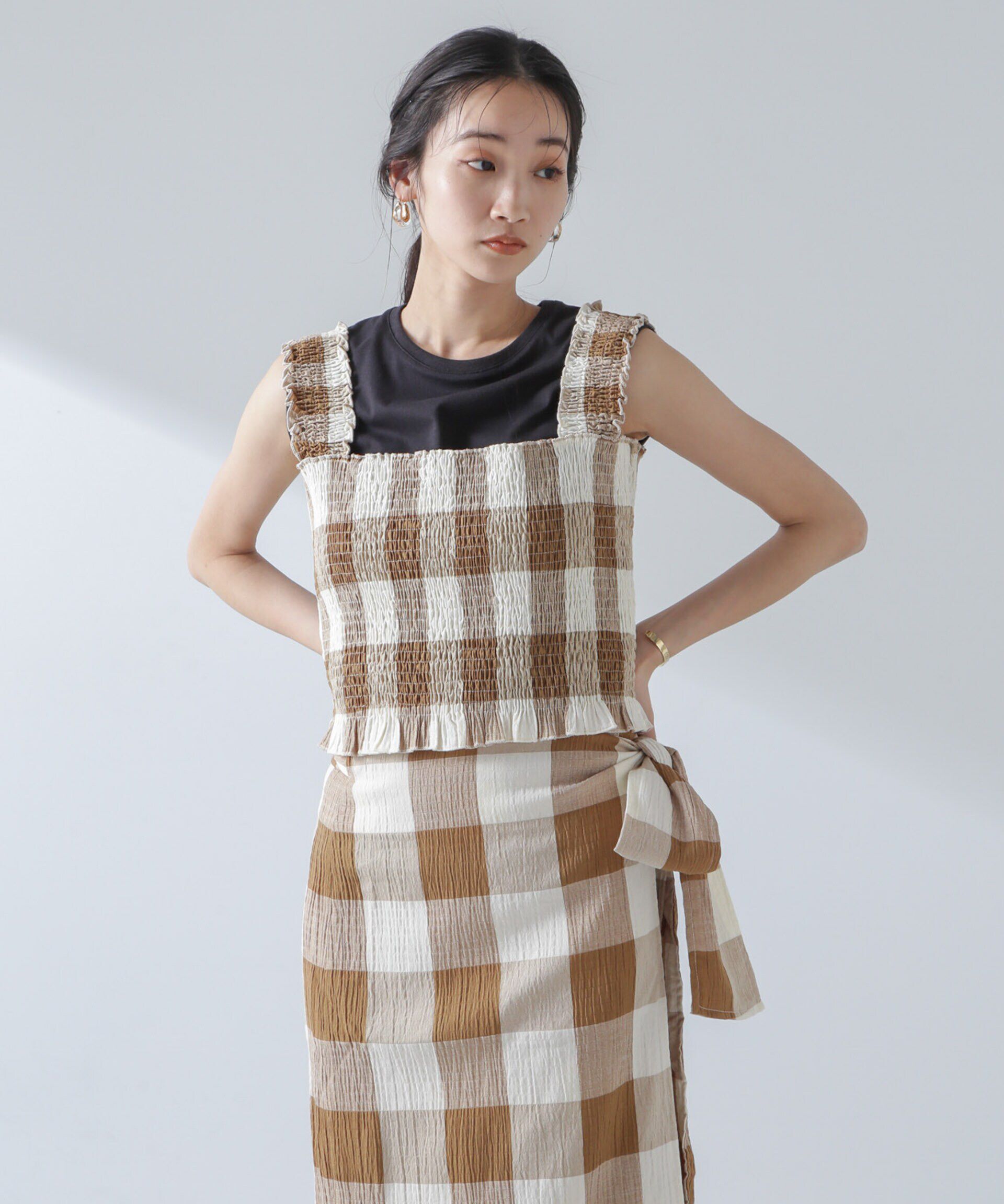 nano･universe「RITA ROW/Checkered smocked body top」|ダウンベスト・ベスト|