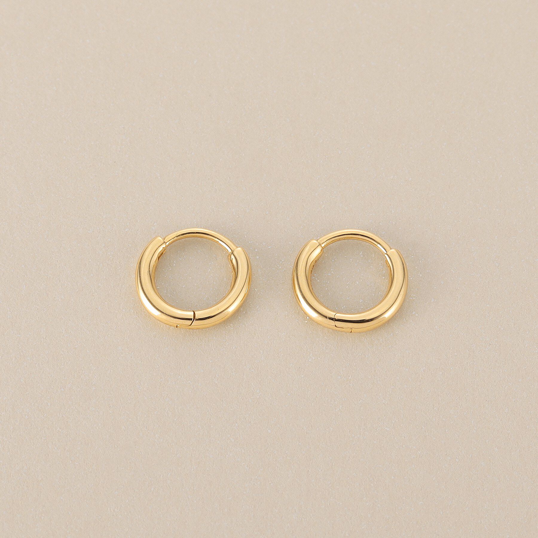 COCOSHNIK「K18丸線 中折れピアス」|ピアス|