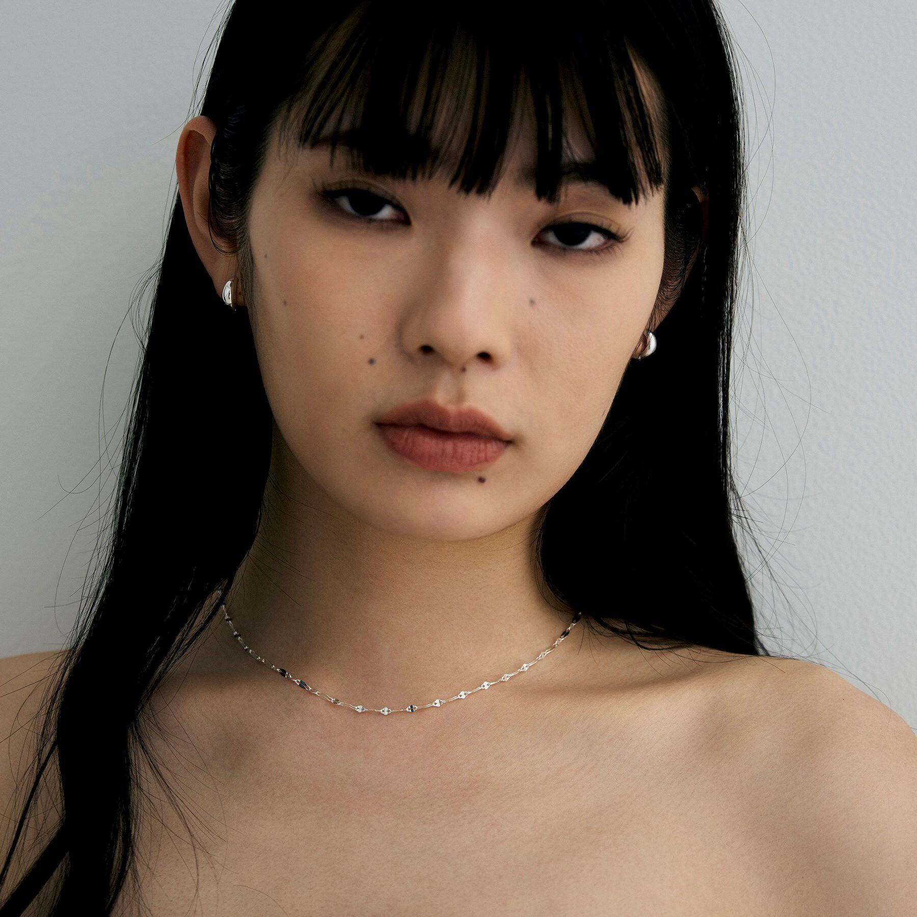 COCOSHNIK ONKITSCH「シルバー ハギーイヤリング マーキス」|イヤリング|