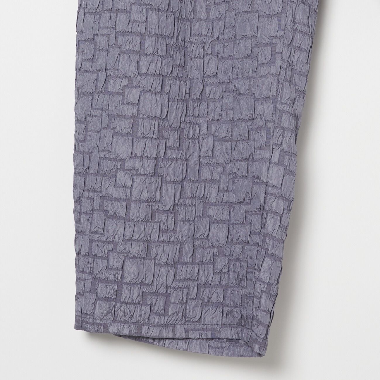 HELIOPOLE「HELIOPOLE JACQUARD CURVY PANTS」|チノ|