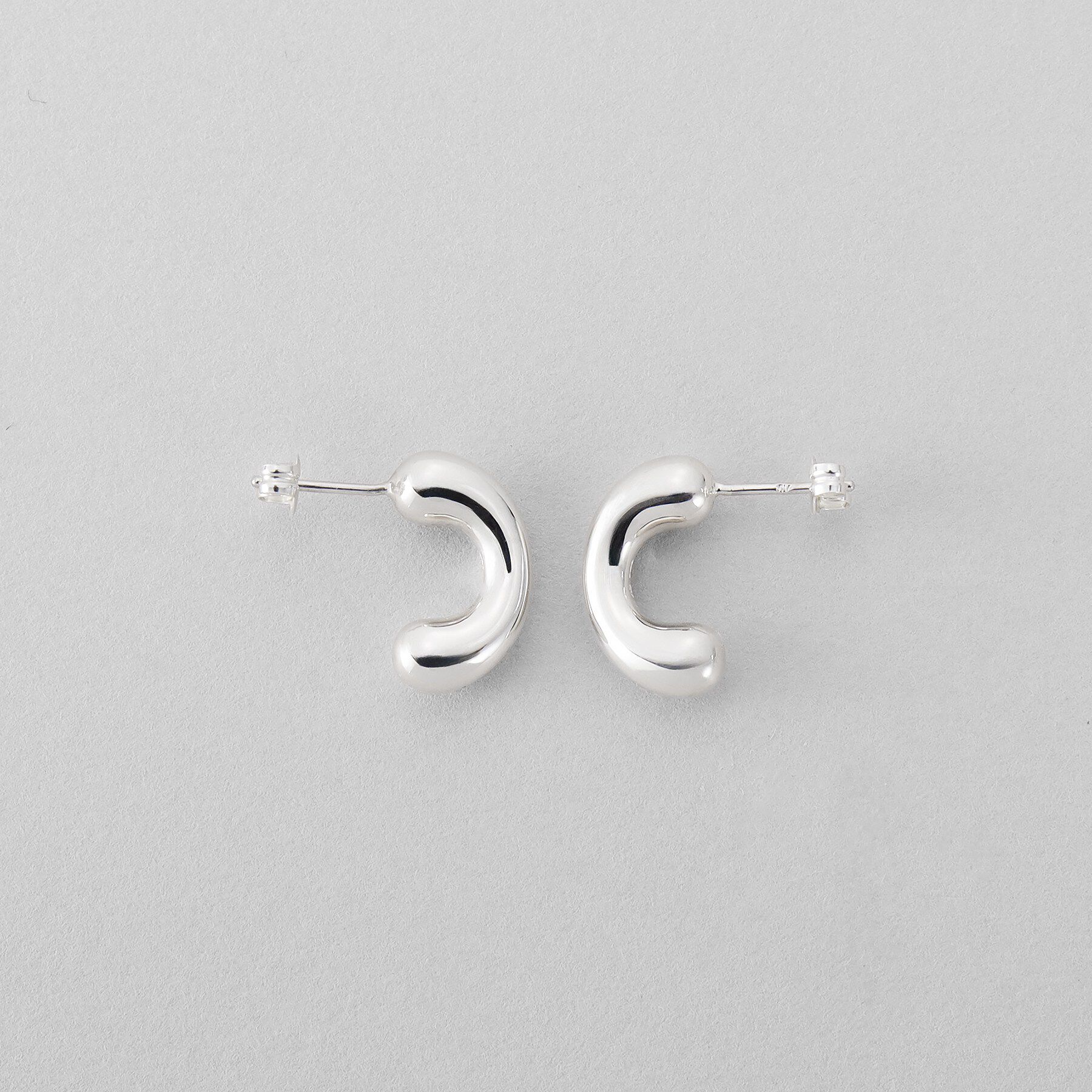 COCOSHNIK ONKITSCH「シルバー ニュアンスアークピアス」|ピアス|