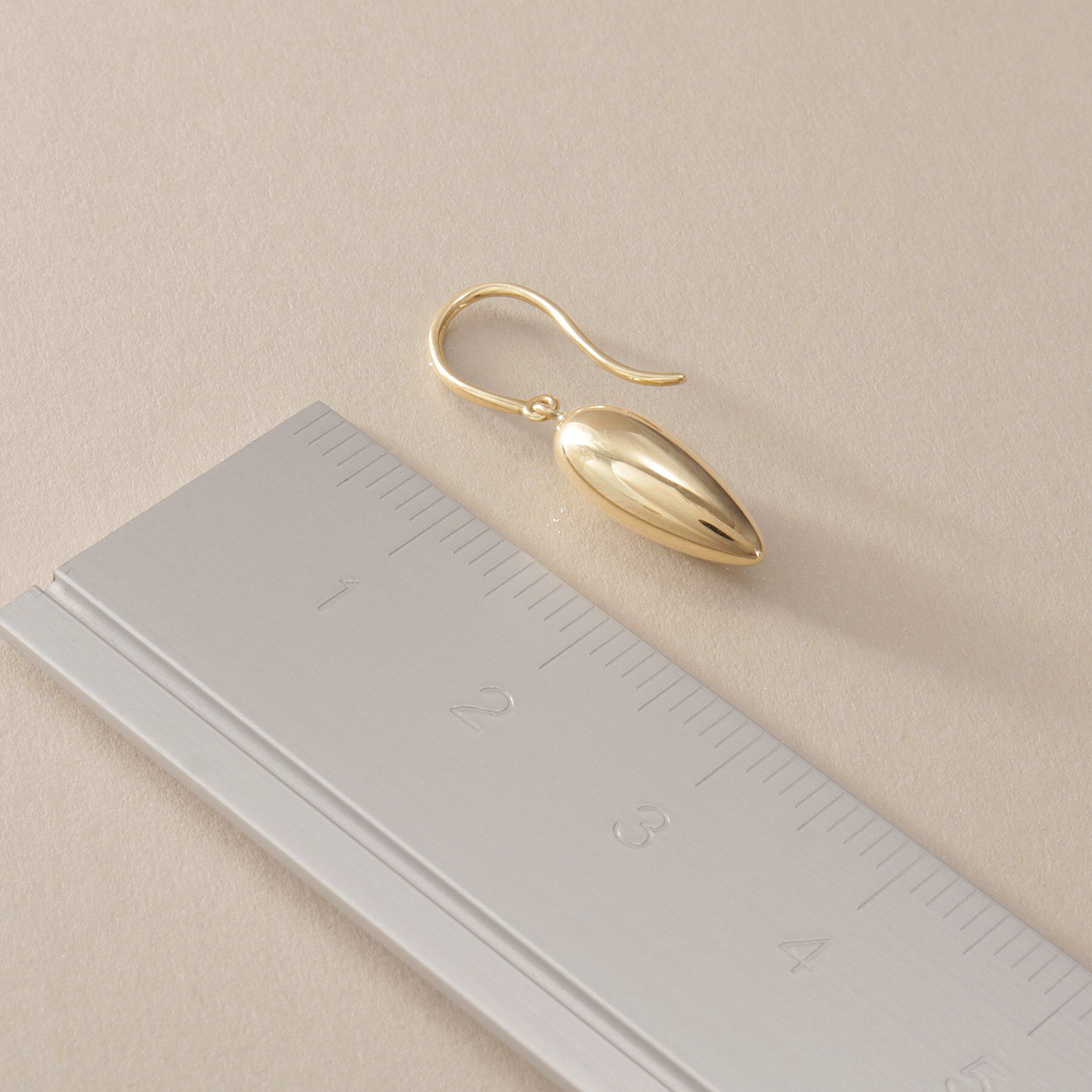 COCOSHNIK「K10中空ドロップシェイプ フックピアス」|ピアス|