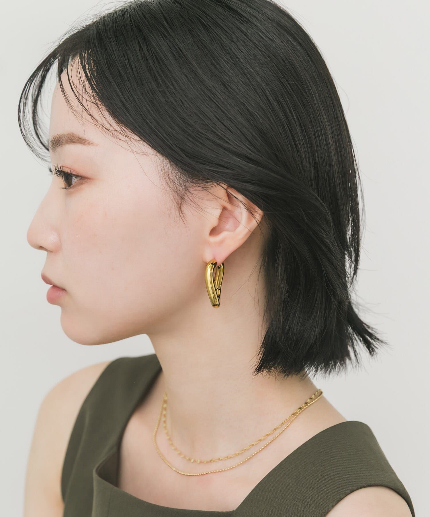 SMELLY「ステンレスニュアンスカーブボリュームピアス」|ピアス|