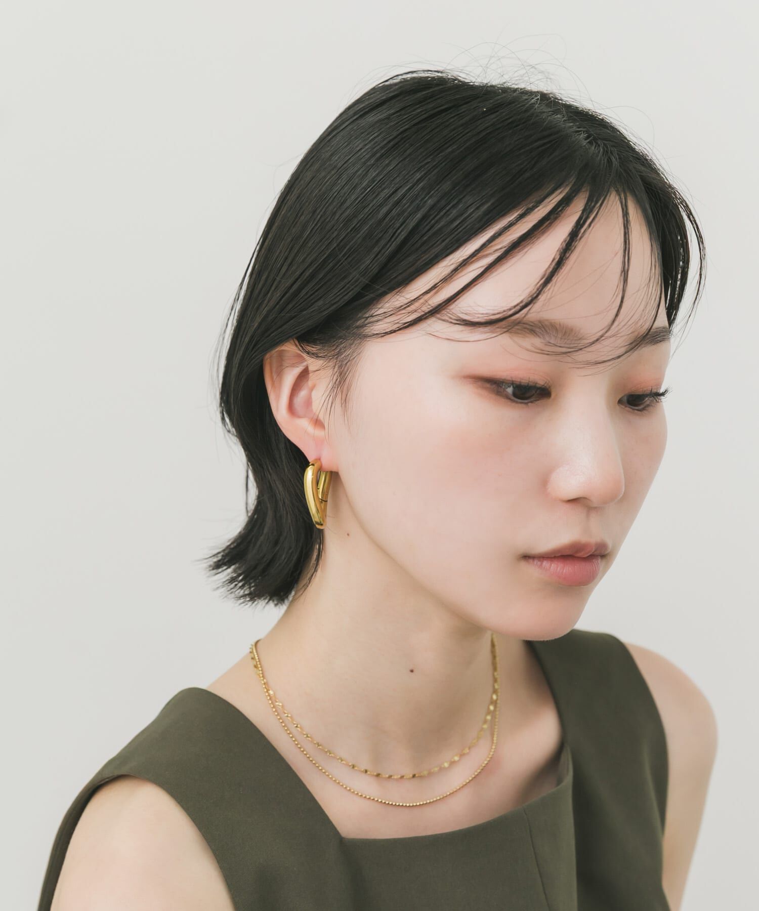 SMELLY「ステンレスニュアンスカーブボリュームピアス」|ピアス|