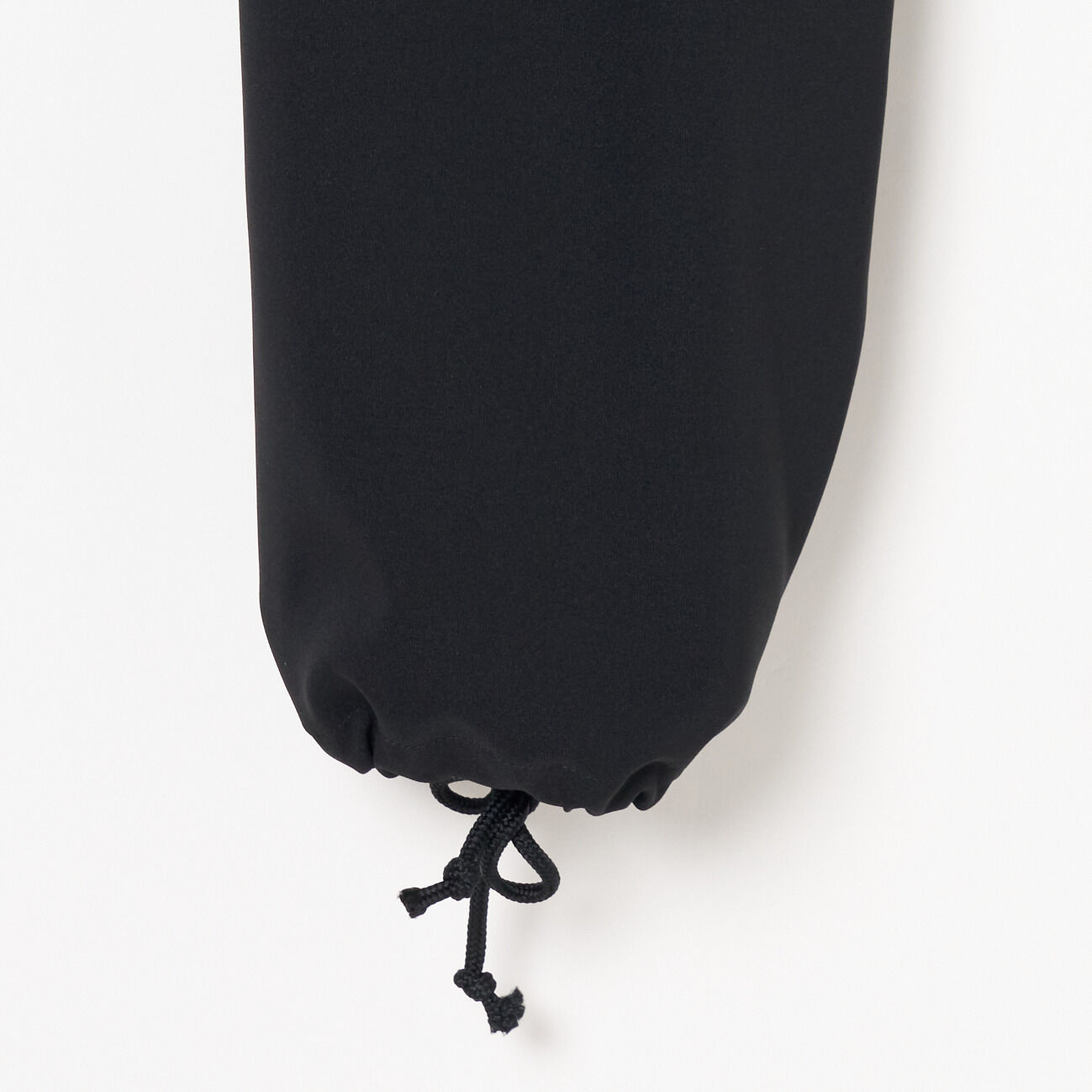 HELIOPOLE「HELIOPOLE DRAWSTRING HEM PANTS」|チノ|