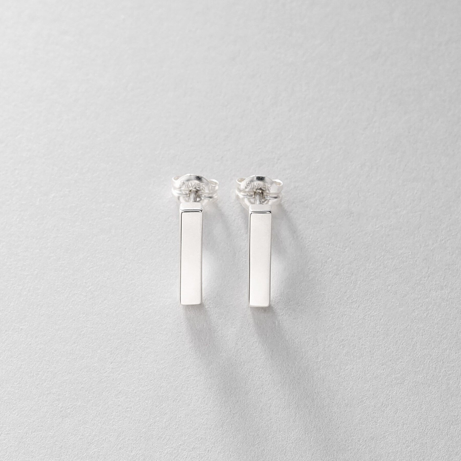 COCOSHNIK ONKITSCH「シルバー レクタングル スタッドピアス」|ピアス|