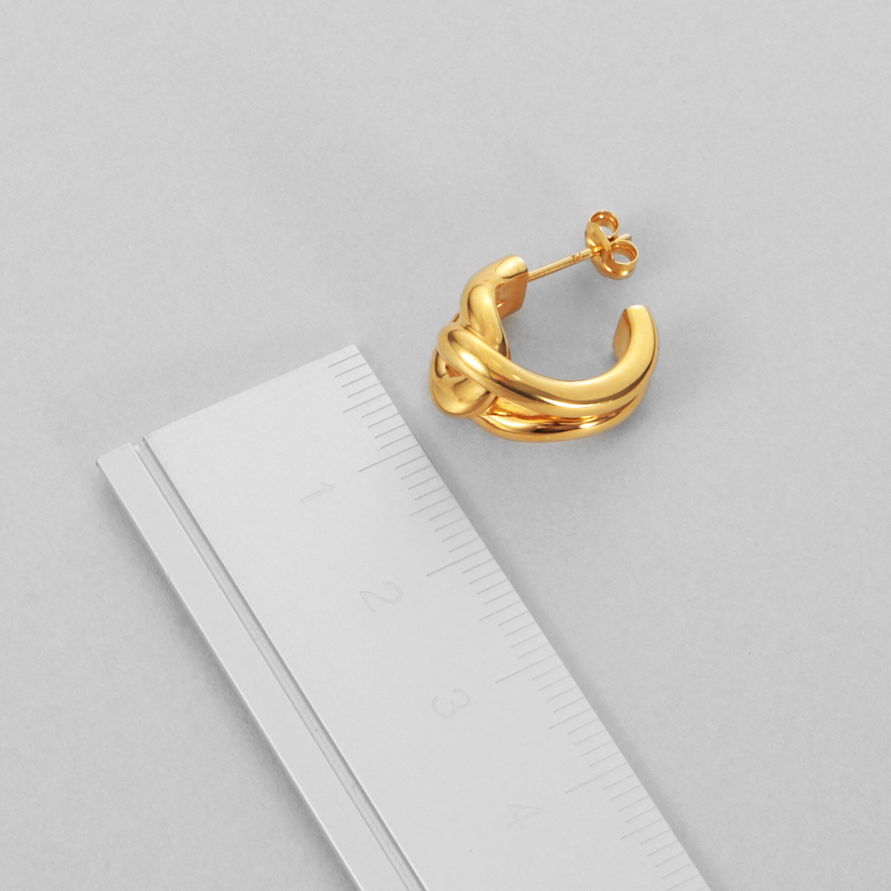 COCOSHNIK ONKITSCH「シルバー スモールフープ ノットピアス GP」|ピアス|