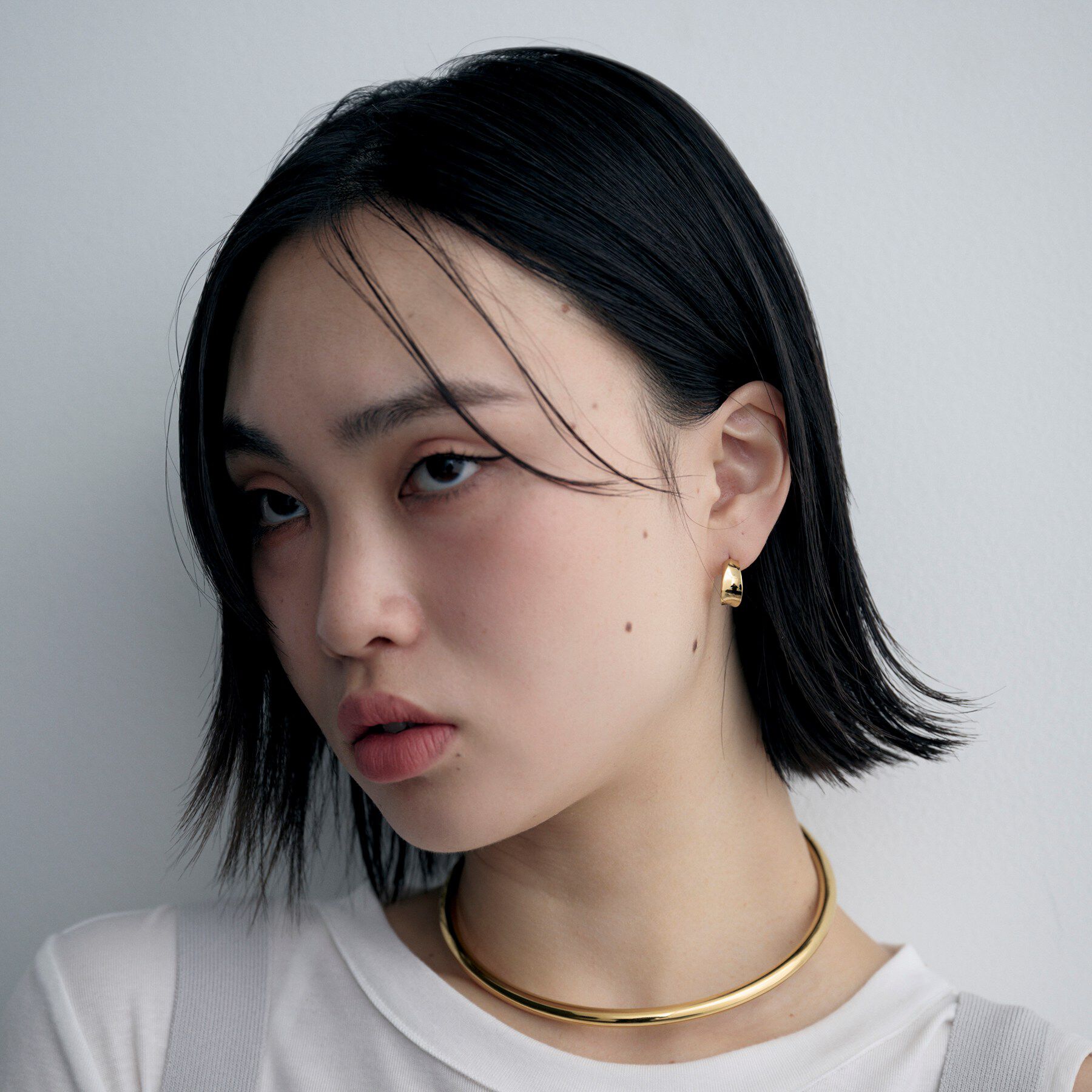 COCOSHNIK ONKITSCH「シルバー フローツイストピアス GP」|ピアス|