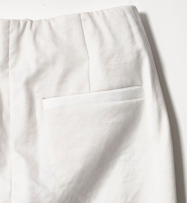 UNITED ARROWS「シャイニー スリム パンツ OFF WHITE ‐ストレッチ ウォッシャブル‐」|スラックス|