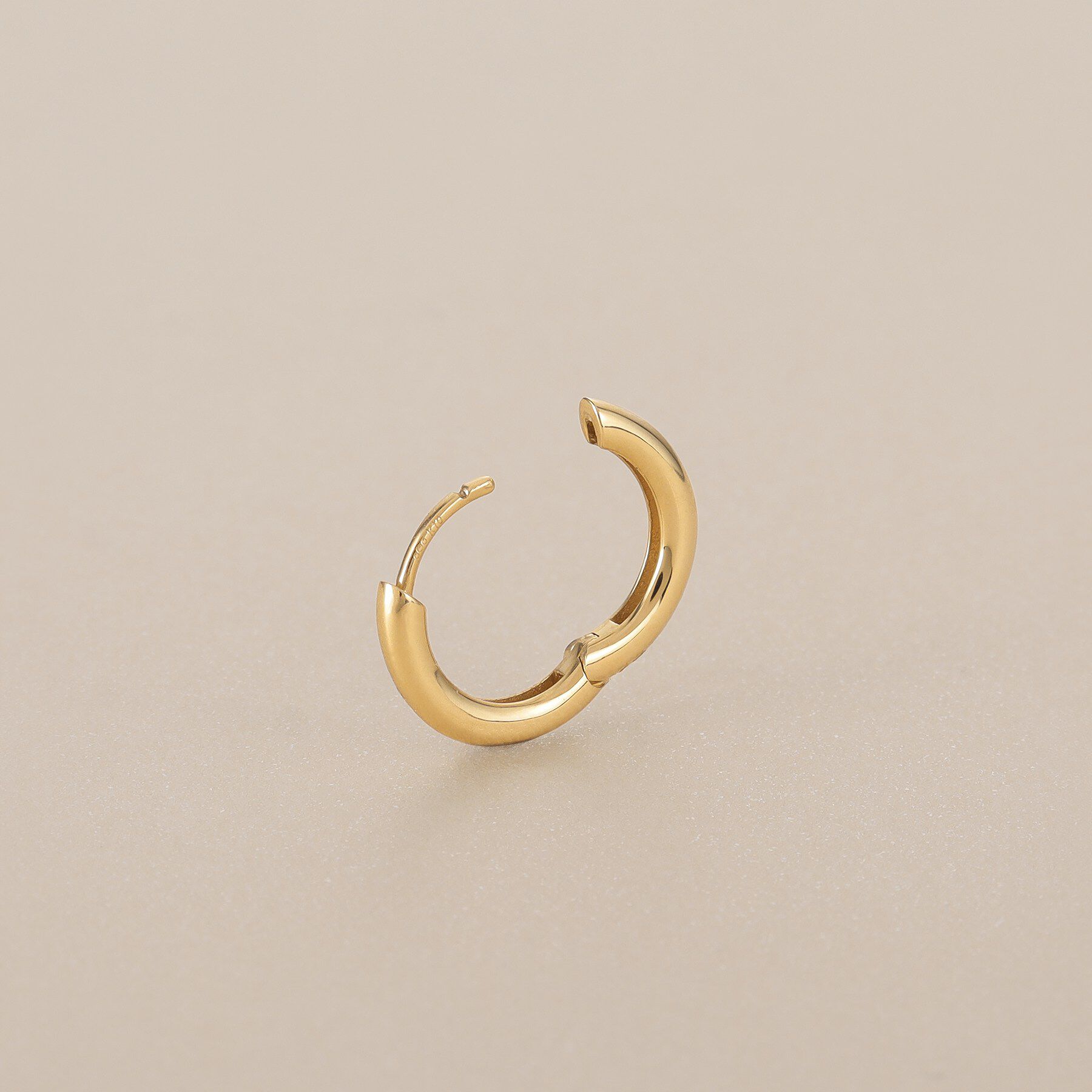 COCOSHNIK「K10丸線 中折れピアス」|ピアス|