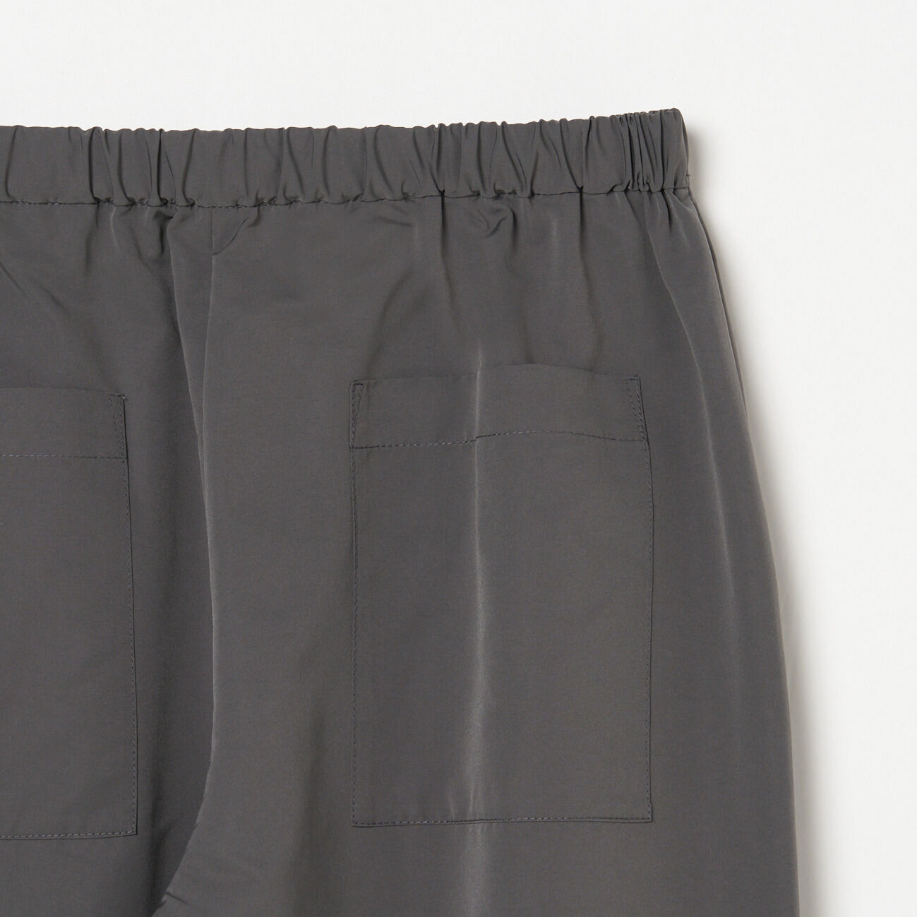 HELIOPOLE「HELIOPOLE PARACHUTE PANTS」|チノ|