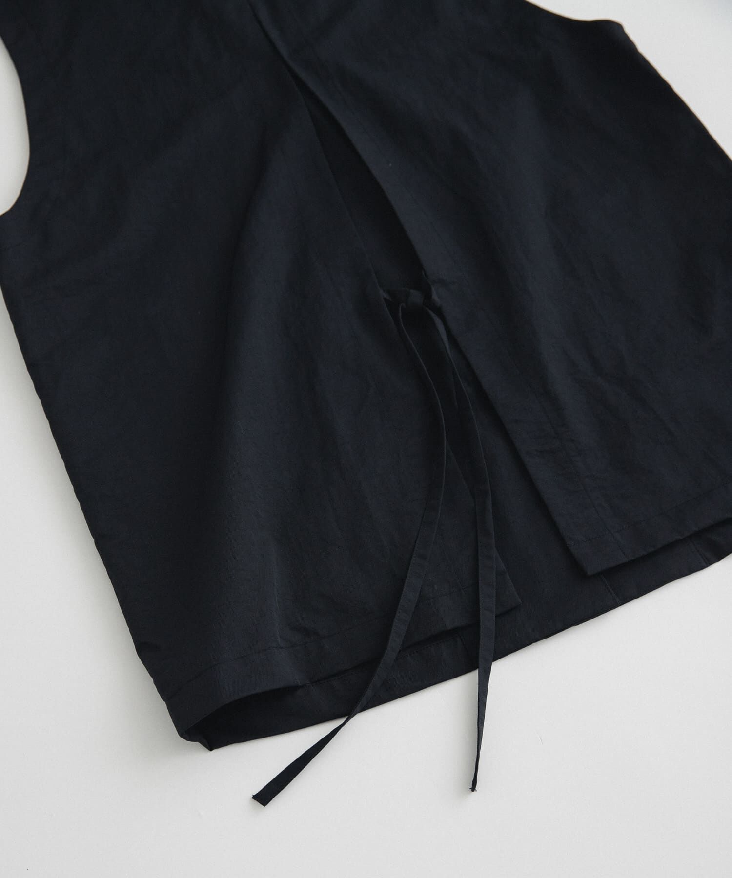 LAATO「no sleeve slit jacket」|ノーカラーコート|