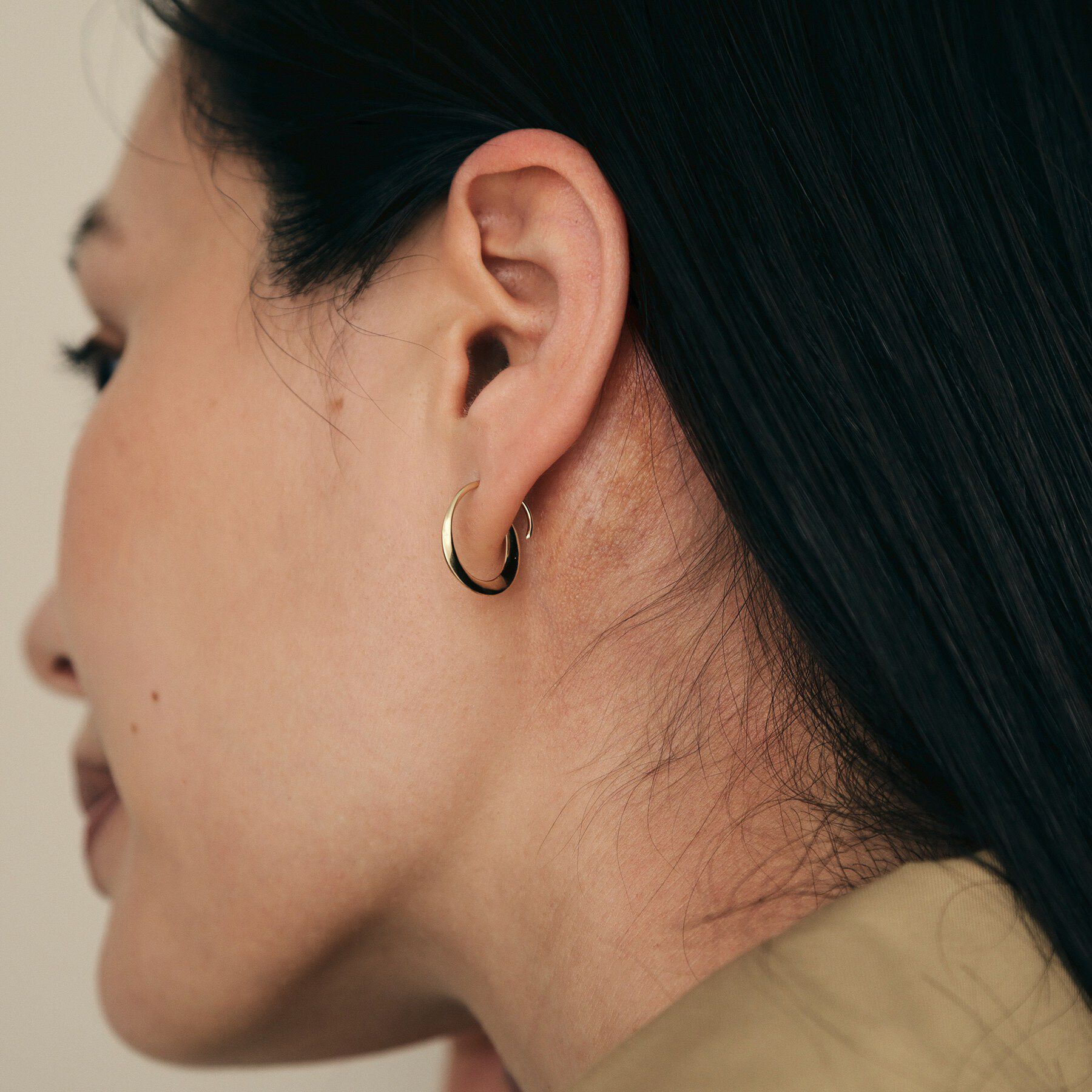 COCOSHNIK「K10ひねり フープピアス」|ピアス|