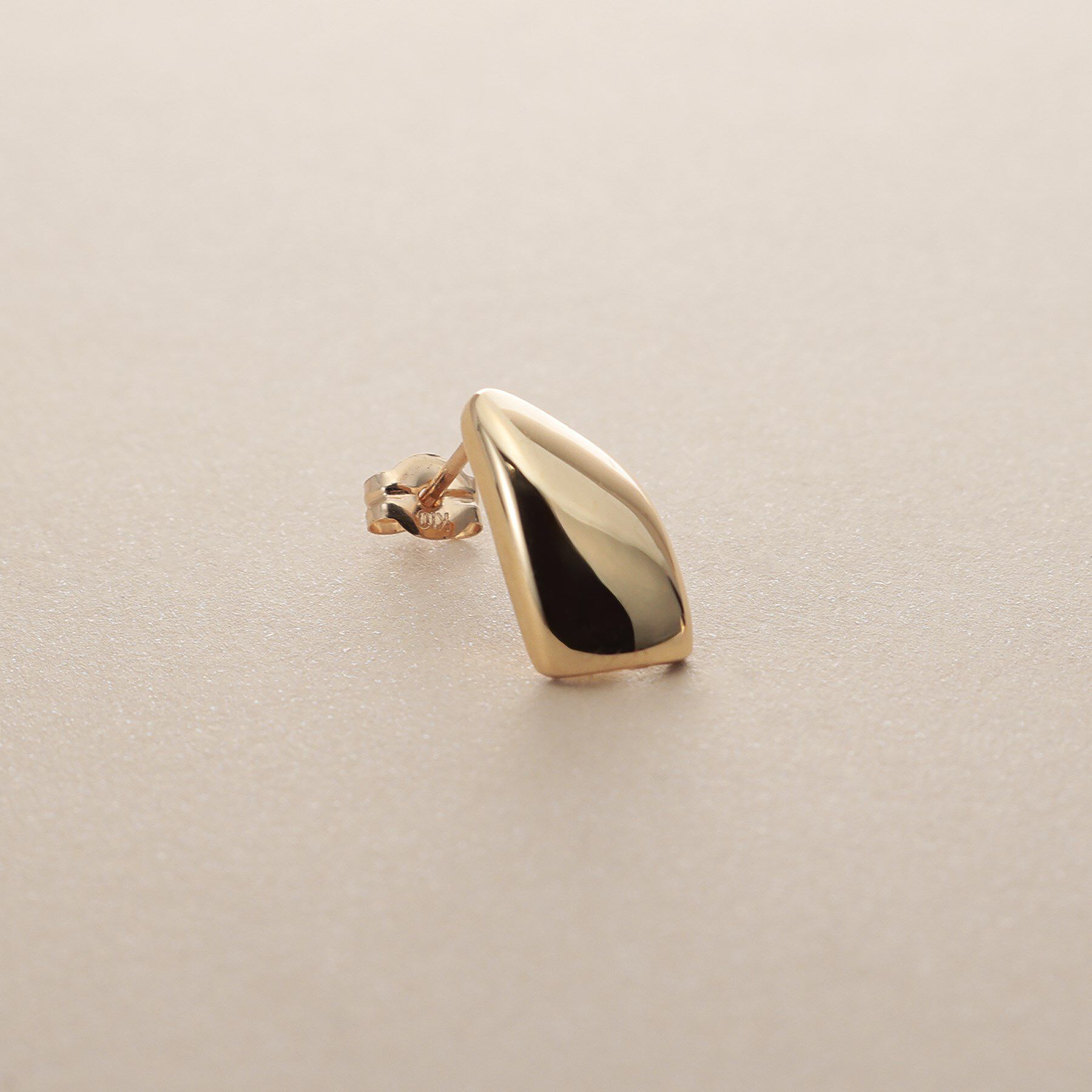 COCOSHNIK「K10甲丸ラップ スタッズピアス」|ピアス|