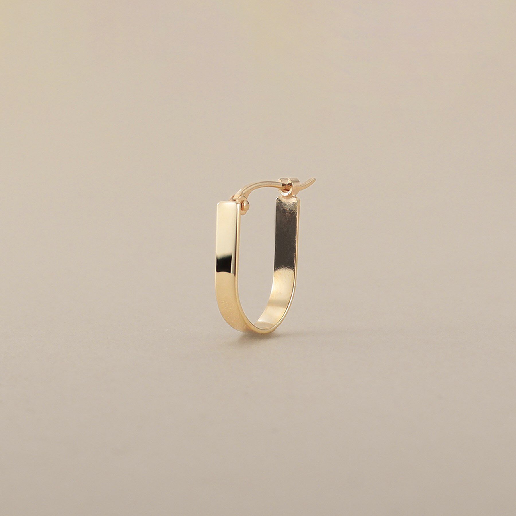 COCOSHNIK「K10平打ち楕円 フープピアス」|ピアス|