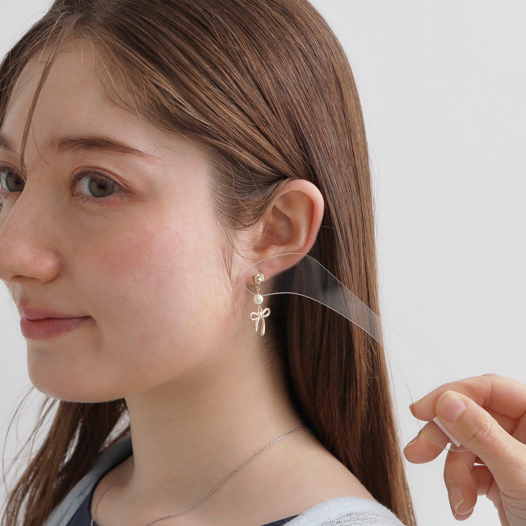 Couture broach「フェイクパール付きリボンモチーフピアス」|ピアス|