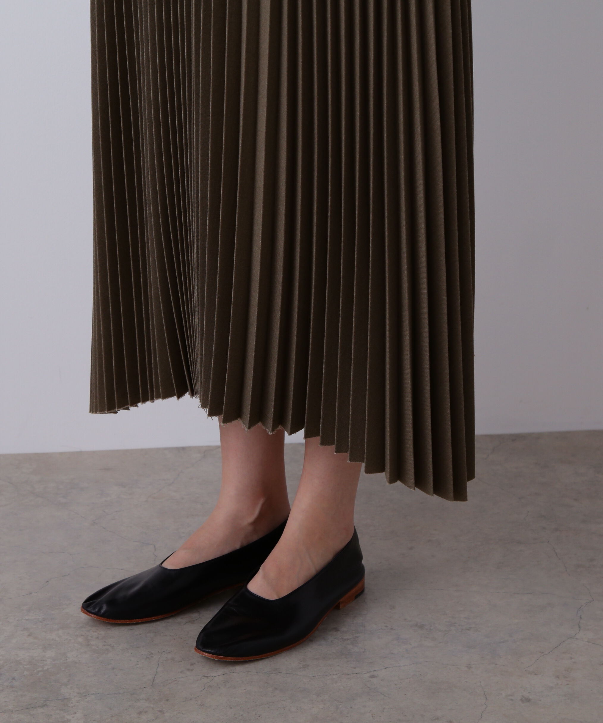 YLEVE 「YLEVE / VINTAGE PIGMENTDYE WOOL PLEATED SKIRT」|スカート|