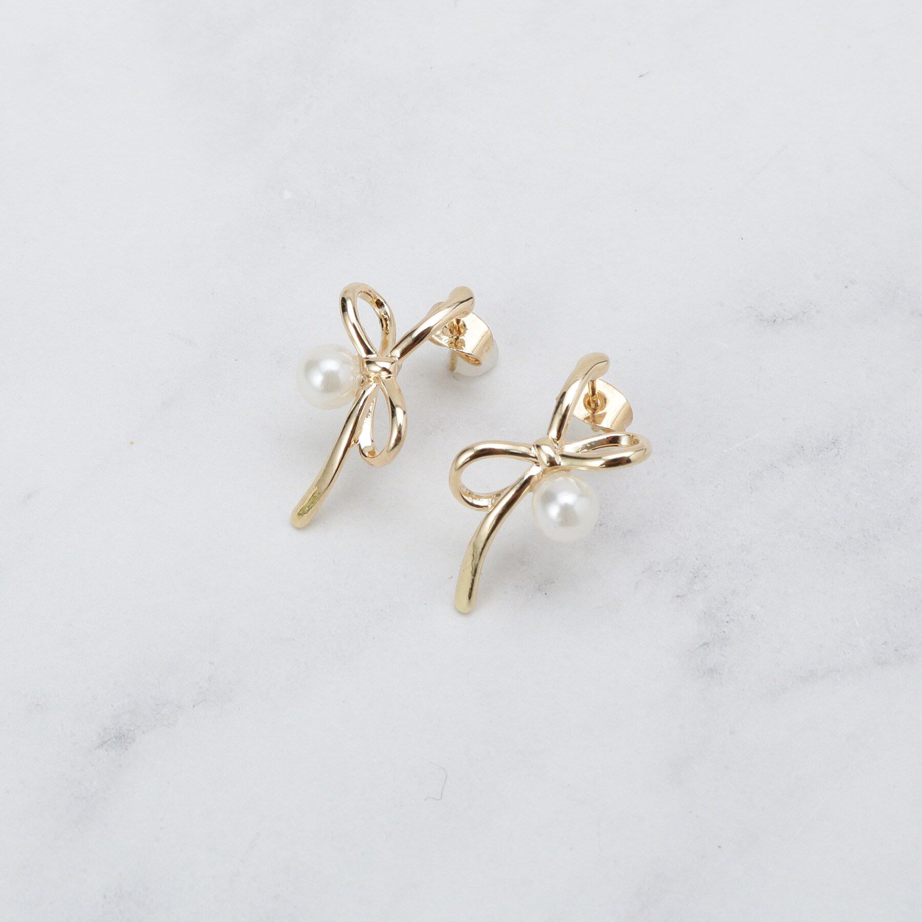 Couture broach「リボンモチーフピアス」|ピアス|