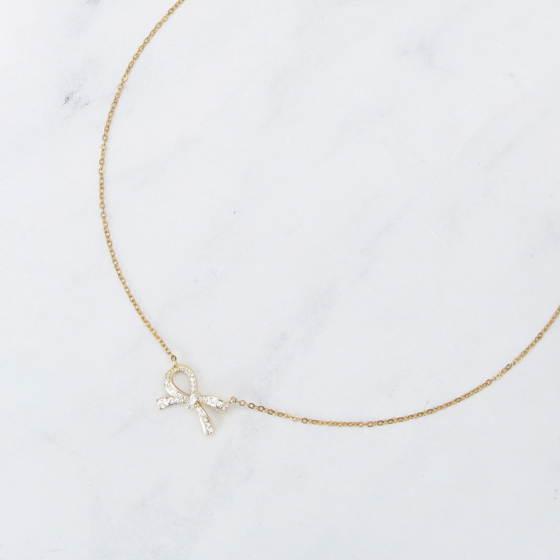 Couture broach「ビジューリボンネックレス」|ネックレス|