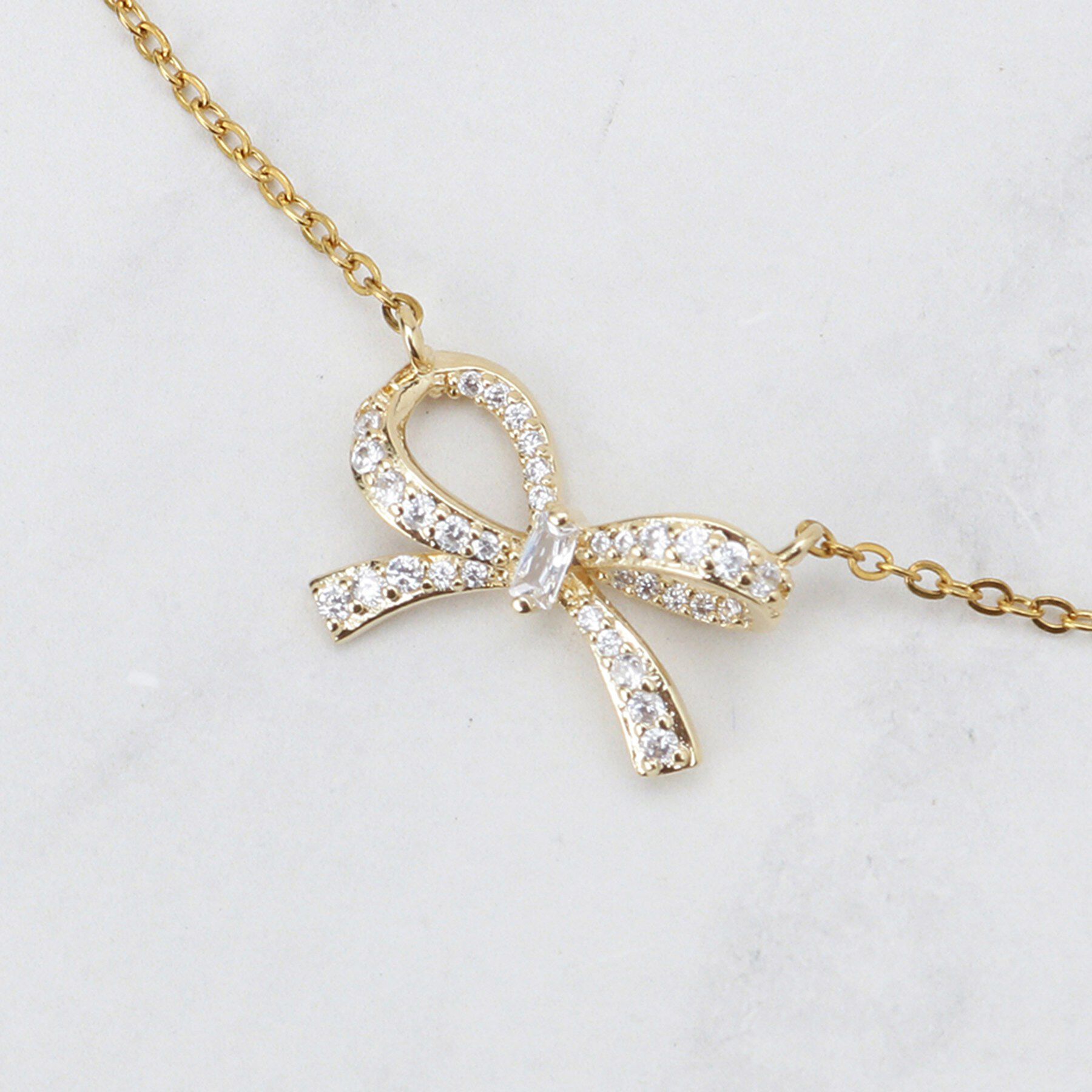 Couture broach「ビジューリボンネックレス」|ネックレス|