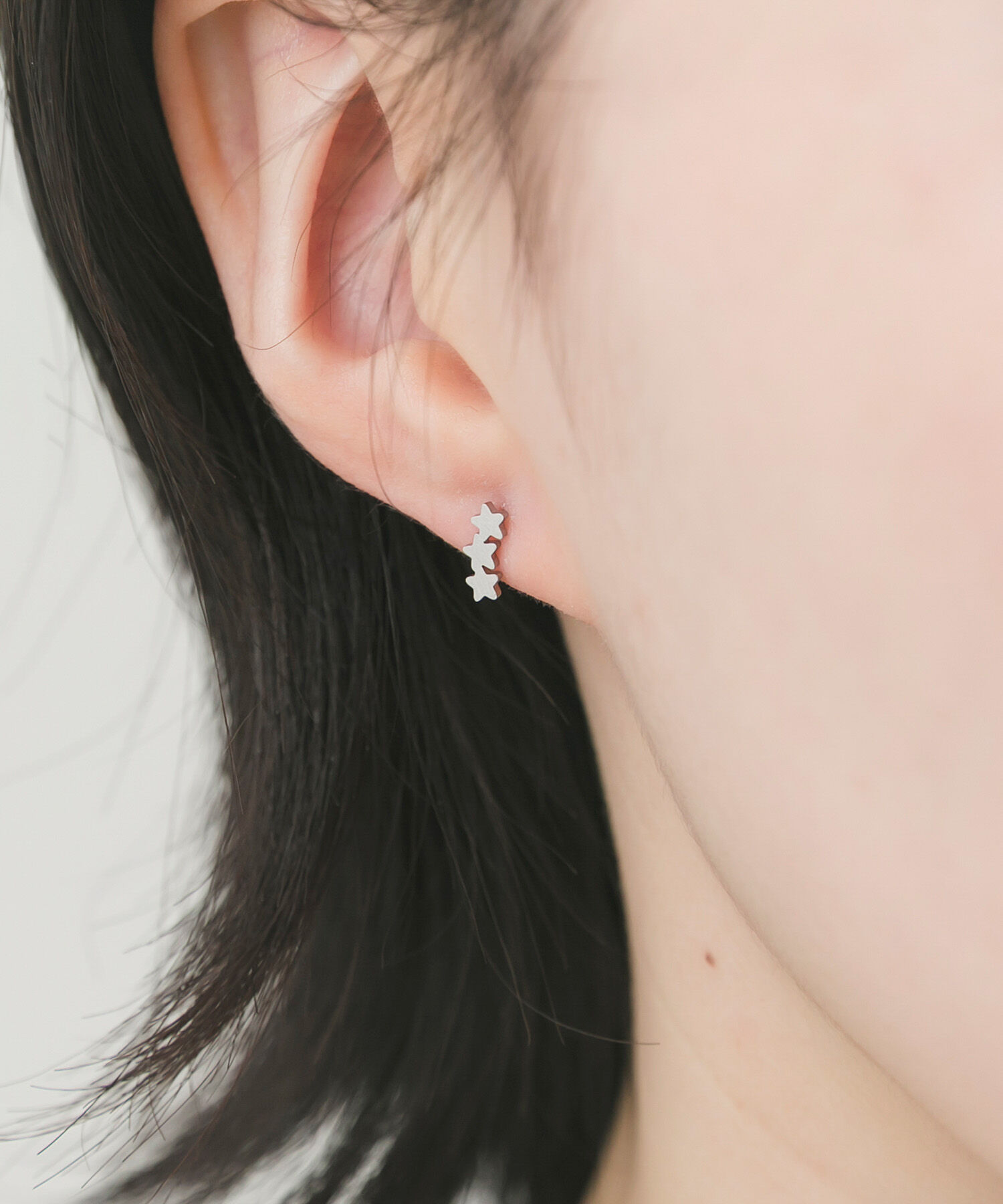 SMELLY「ステンレストリプルスターカーブプチピアス」|ピアス|シルバー