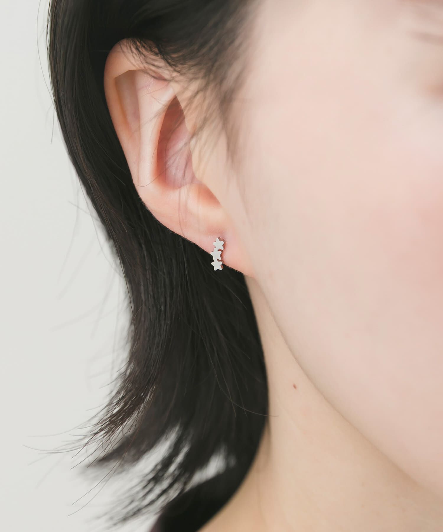 SMELLY「ステンレストリプルスターカーブプチピアス」|ピアス|