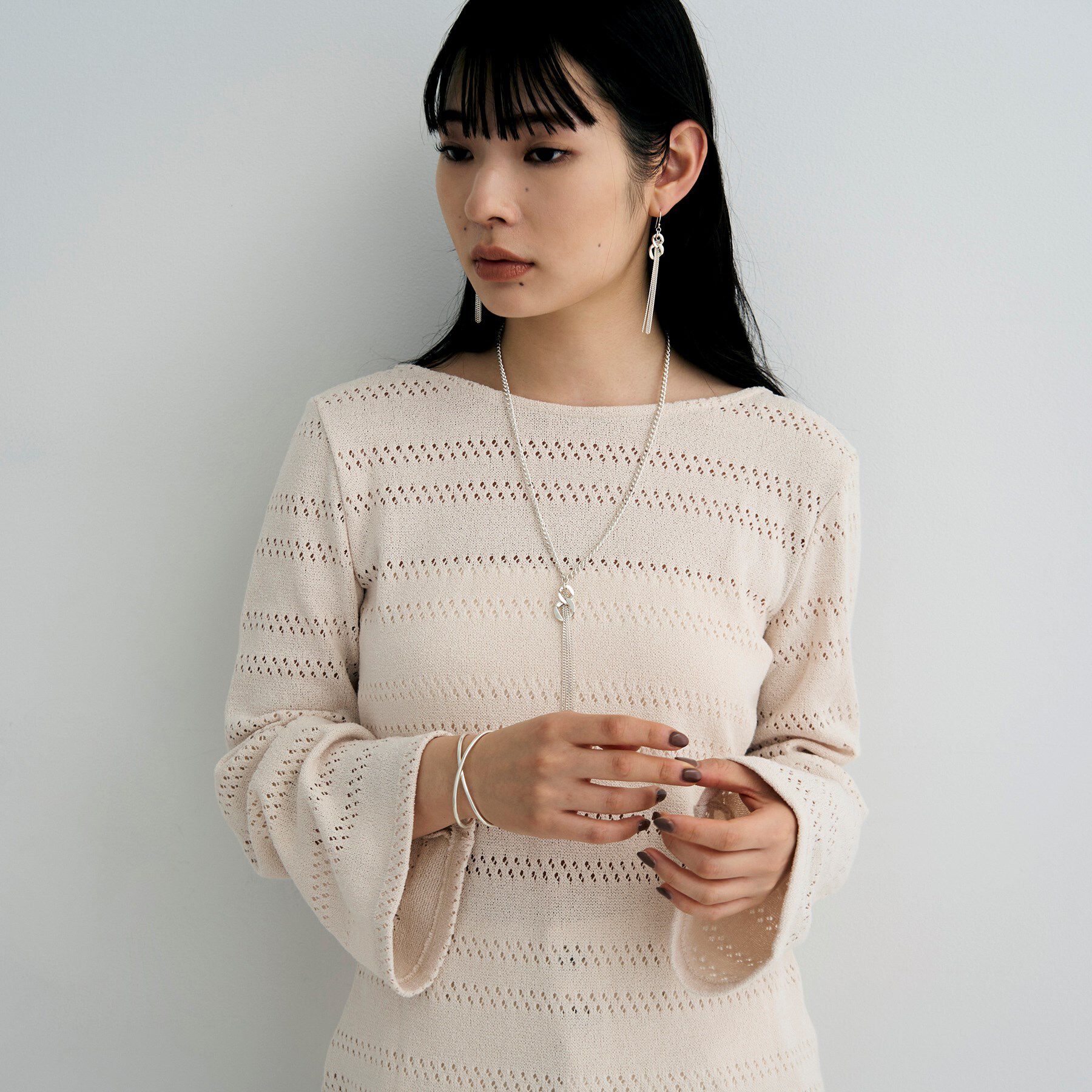 COCOSHNIK ONKITSCH「シルバー カーブチェーンモチーフフリンジピアス」|ピアス|