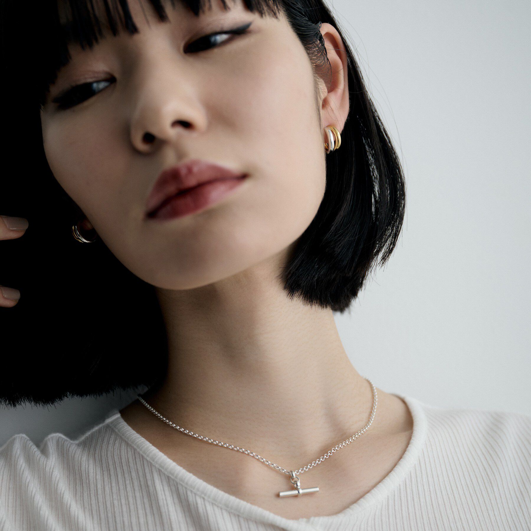 COCOSHNIK ONKITSCH「シルバー コンビカラー スモールフープ デュアルドームピアス」|ピアス|