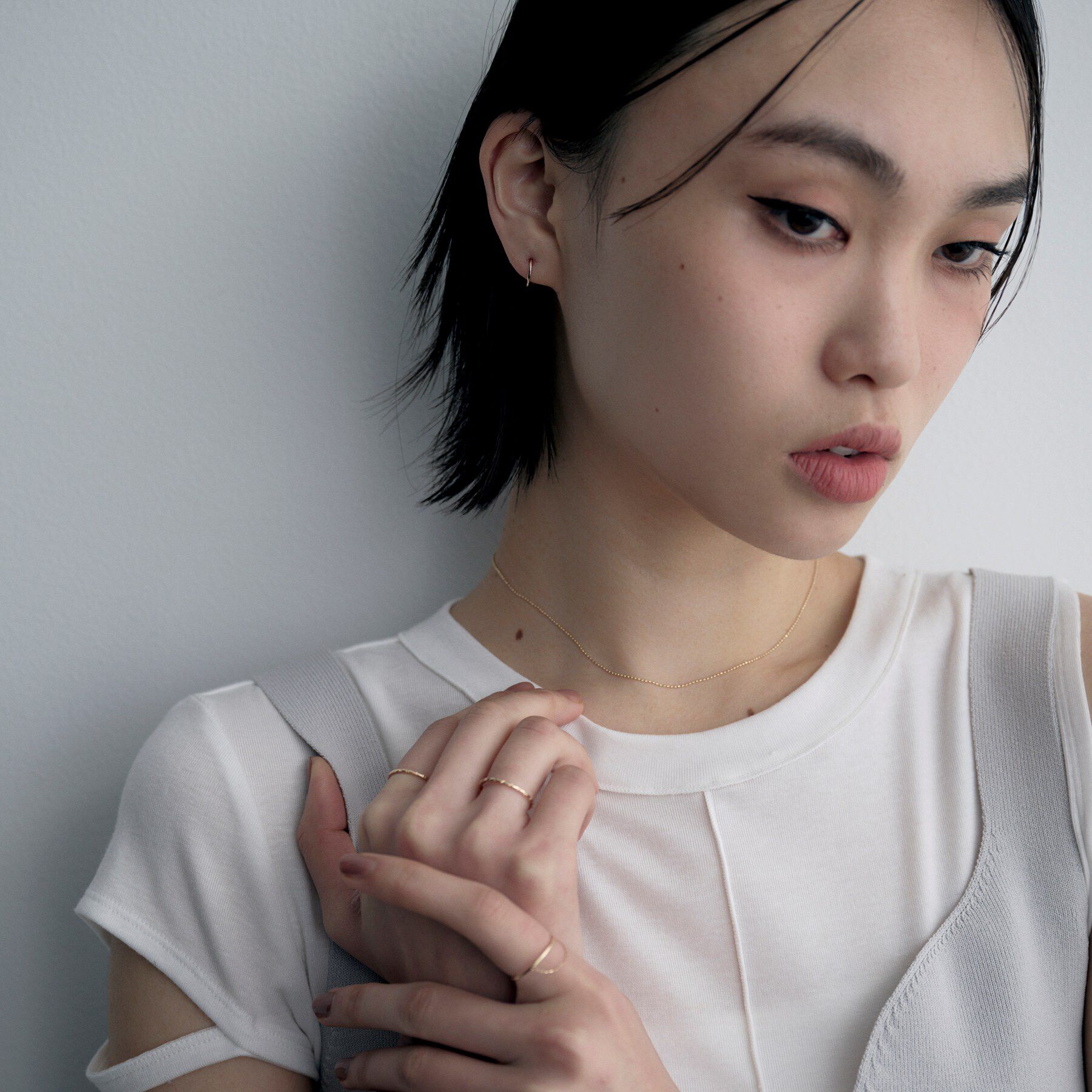 COCOSHNIK ONKITSCH「K10ツイステッドフープピアス」|ピアス|