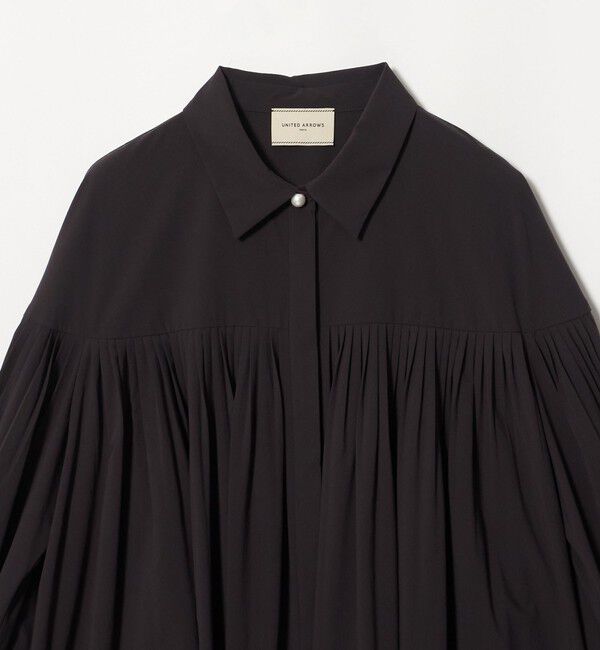 UNITED ARROWS「パールライク ボタン タック フレア ブラウス」|シャツ・ブラウス|