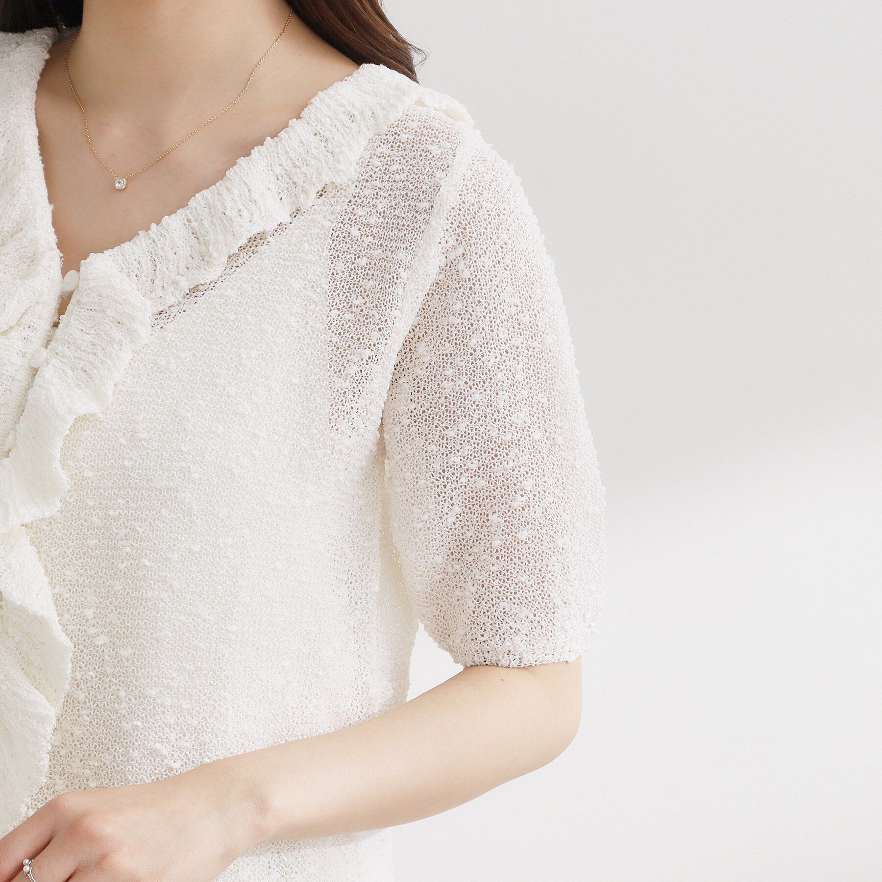Couture broach「フリルVネックニットカーディガン」|カーディガン|